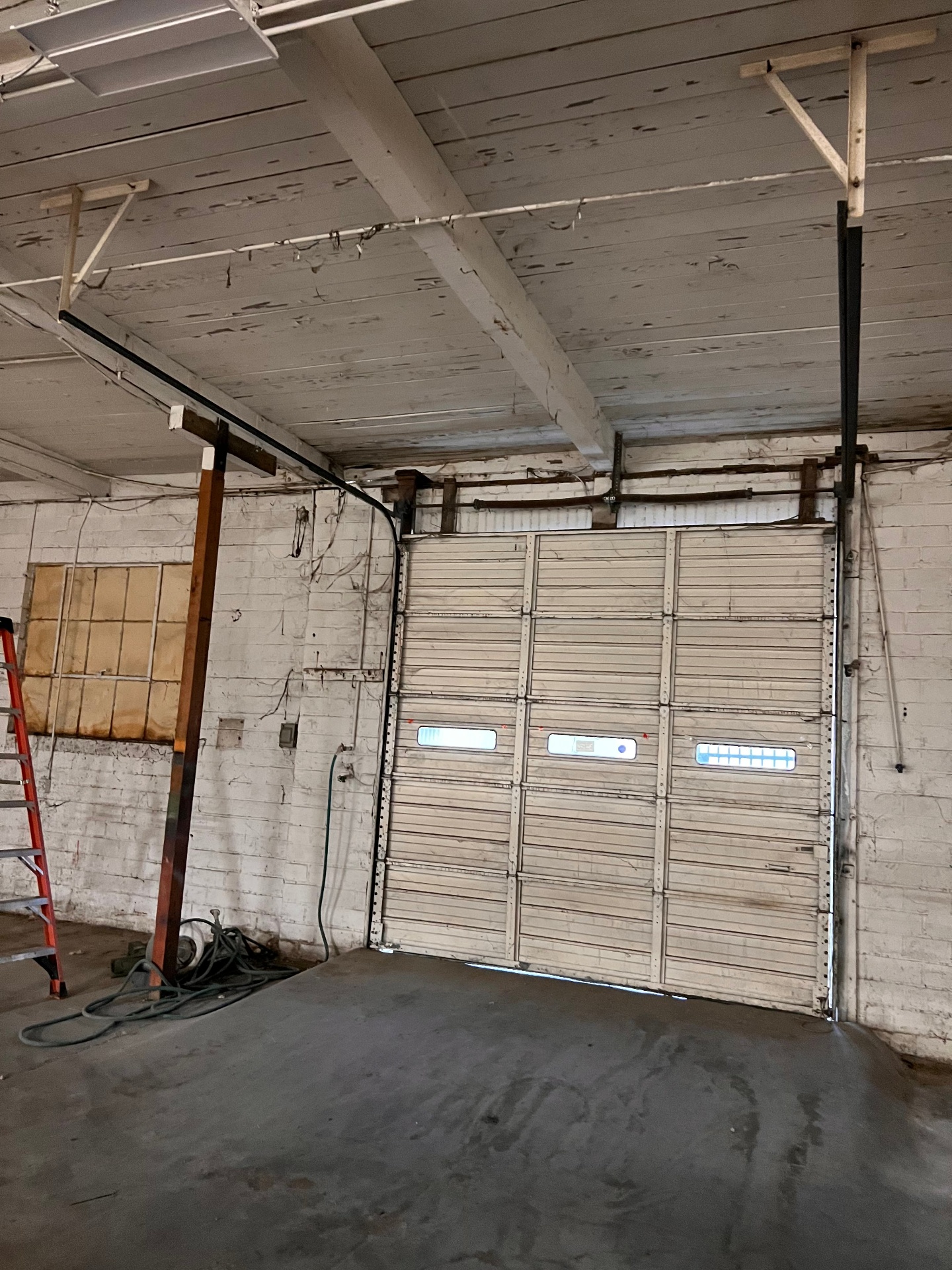 Garage door with window panels, viewed from inside